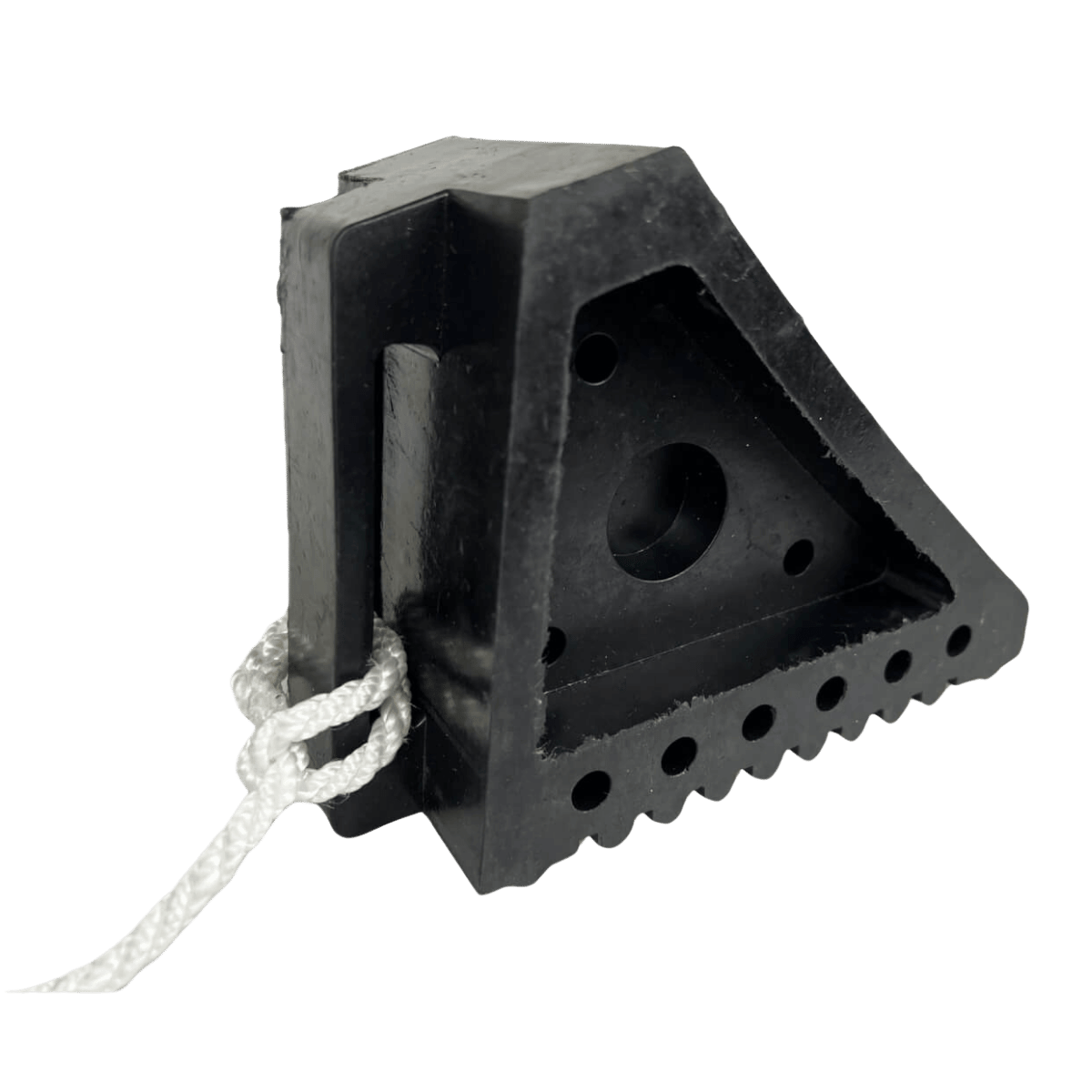 Small solid rubber wheel chock with side grip slot and pull rope for easy removal, ideal for trailers and caravans.
