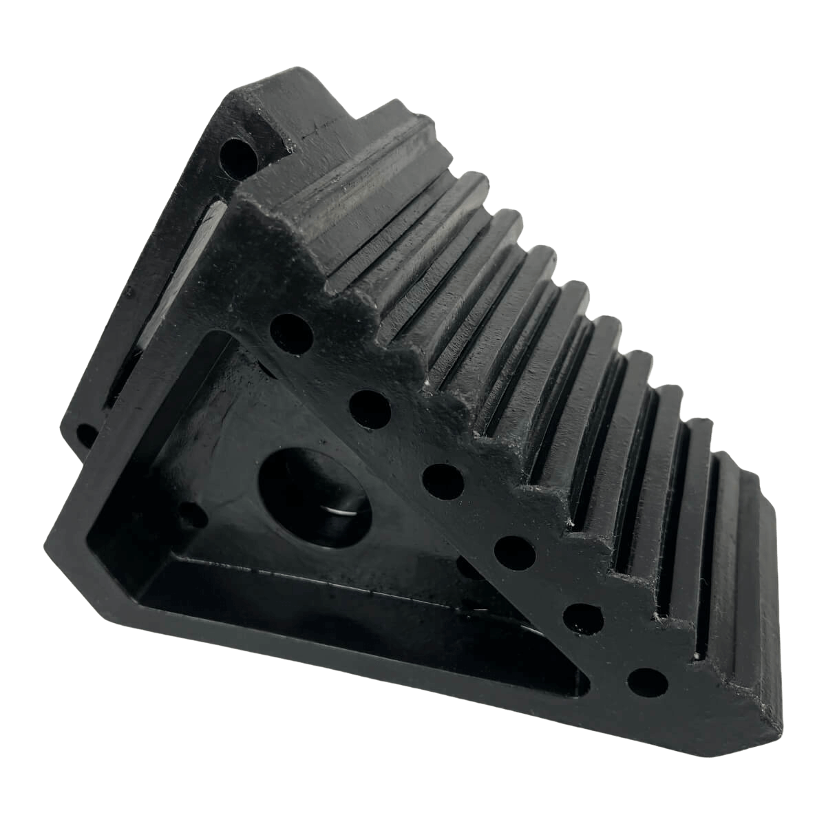 Small solid rubber wheel chock for trailers and caravans, with grooved surface for grip